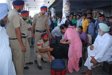 A police team carries out searches at the bus stand in Bathinda on Saturday.