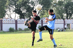 Players in action during a match in the Lala Nemi Dass Memorial Football Tournament in Dehradun on Saturday.