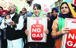 PDP president Mehbooba Mufti leads a demonstration against the cap on subsidised LPG cylinders and its shortage in the Kashmir valley, on Saturday. A Tribune Photograph