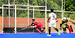 A match in progress during the 8th All-India GGS Gold Cup Hockey Tournament in Ludhiana