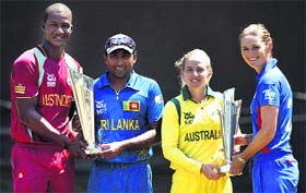 The captains of the mens event finalists, Darren Sammy of West Indies and Mahela Jayawardene of Sri Lanka, pose with the captains of the womens competition finalists, Australias Jodie Fields and Englands Charlotte Edwards, in Colombo on Saturday