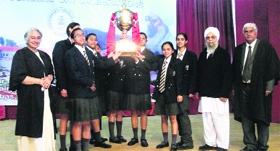 Students of Atari House with the Cock House shield during the 43rd founders day celebrations of Guru Nanak Fifth Centenary School in Mussoorie on Sunday