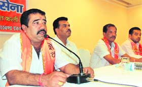 President of the state unit of the Shiv Sena Gaurav Kumar addresses a press conference in Dehradun on Sunday