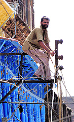 Power Development Department employees conduct repair work at Panjtirthi area of Jammu