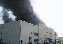 Smoke billows out of the pharmaceutical factory where fire broke out in Samba on Sunday
