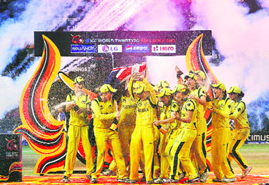 Australian women cricketers celebrate the win over England in the final at the R. Premadasa Stadium in Colombo on Sunday.