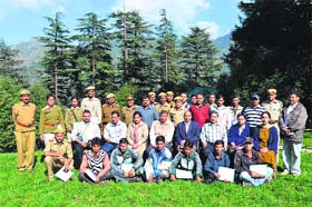 Forest officials and guards who participated in a bird-watching camp at Dhanaulti on Monday