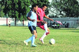 Players in action during a match in the Lala Nemi Dass Memorial Football Tournament in Dehradun on Monday