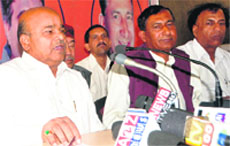 BJP state in charge Thavar Chand Gehlot and President of the state unit of the party BS Chuphal at a press conference in Dehradun on Monday. Tribune photo: Vinod Pundir
