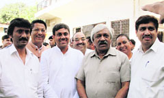 Congress candidate for the Tehri byelection Saket Bahuguna, along with Sports Minister Dinesh Aggarwal, seeks votes from Bar Association members in Dehradun on Monday. Tribune photo: Vinod Pundir