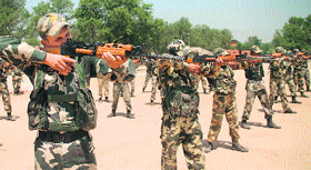 CRPF personnel attend a training session at the CRPF Training Centre near Nagrota in the Jammu region.
