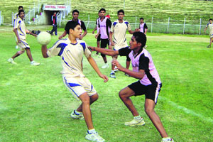 Players in action during the ongoing Sub-Junior National Handball Championship in Srinagar on Monday.
