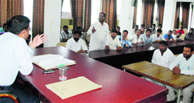 Private garbage collectors at a meeting with MC Commissioner Rakesh Kumar Verma in Ludhiana on Monday.