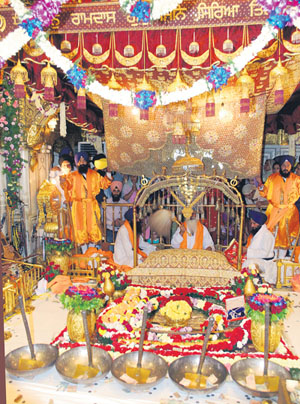 A view of the Jalau (show of splendour) displayed in the sanctum sanctorum of the Golden Temple on the occasion of the birth anniversary of the fourth Sikh Guru, Guru Ram Dass, founder of the Amritsar city, in Amritsar on Tuesday.