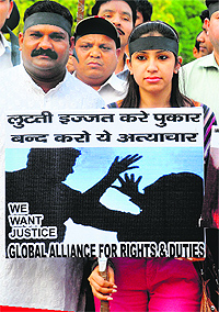 Activists of the BJP participate in a silent march in Chandigarh on Tuesday against the recent rape cases in Haryana