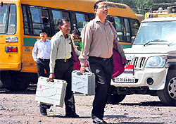 Polling parties from Dehradun leave for polling stations for the Tehri byelection on Tuesday