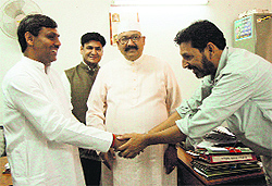 Congress candidate for the Tehri bypoll Saket Bahuguna, along with Pauri Garhwal MP Satpal Maharaj, convasses at the Secretariat in Dehradun on Tuesday