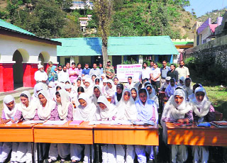 Army distributes furniture to government schools in Rajouri on Tuesday.