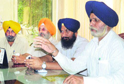 Mayor Harcharan Singh Gohalwaria addresses a press conference at his camp office in Ludhiana on Tuesday. Tribune photo: Himanshu Mahajan