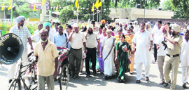 Former Minister Laxmi Kanta Chawla participates in a protest march in Faridkot on Tuesday. 