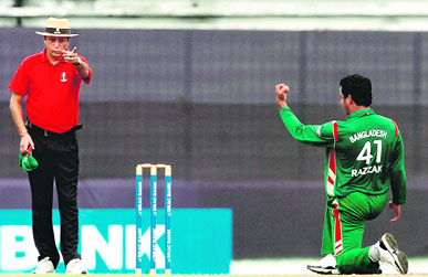 A photograph of Bangladesh umpire Nadir Shah, who has allegedly been caught in a TV sting operation, shows him giving New Zealand batsman Scott Styris out off Abdur Razzak during a One-day match in Dhaka in October 2008. 