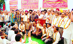 Members of the Northern Railway Mens Union hold a 24-hour-long hunger strike for the acceptance of their demands in Amritsar on Wednesday