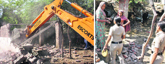 An earth-moving machine razes illegal structures; and (right) policewomen talk to residents during an anti-ancroachment drive conducted by the MC at Rally village in Sector 12, Panchkula, on Wednesday. 