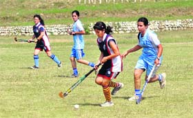 Players in action during Inter-Collegiate Hockey (Women) Tournament at campus ground at University of Jammu on Wednesday