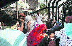 The accused in the flesh trade racket being taken in a vehicle to a police station in Ludhiana on Wednesday