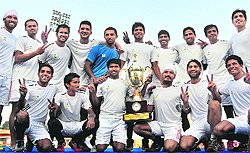 Winners of the 8th All-India Guru Gobind Singh Gold Cup Hockey Tournament at the Prithipal Singh Astro Turf Hockey Stadium in Ludhiana on Wednesday