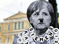 A banner with the picture of German Chancellor Angela Merkel is seen during a protest in Athens. Merkel got a hostile reception when she flew into Athens on her first visit to the country since the debt crisis