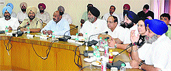 Punjab Deputy Chief Minister Sukhbir Badal (second from left) discusses the master plan of Amritsar with the district officials on Thursday