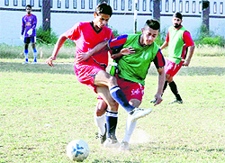A match in progress during the Lala Nemi Dass Memorial Football Tournament in Dehradun on Thursday