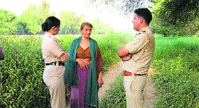The police quizzes Krishna Devi, who along with her two sons jumped into a canal, but was saved, after her daughter-in-law lodged a complaint of rape against them at Bhuna in Fatehabad.