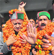 HPCC chief Virbhadra Singh gets a warm welcome at the Kangra airport on Thursday.