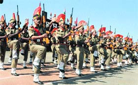 Border Security Force soldiers take part in a passing-out parade in Humhama on the outskirts of Srinagar on Thursday