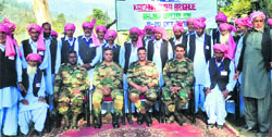 Army officers and senior citizens during the flagg-off ceremony at Mendher on Thursday. A tribune photograph