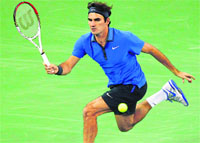 Roger Federer beat compatriot Stanislas Wawrinka 4-6, 7-6, 6-0 in Shanghai on Thursday.  AFP