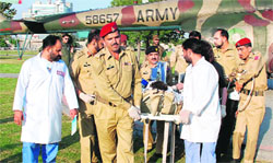 Injured Malala Yousufzai being shifted to an army hospital in Rawalpindi on Thursday.  AFP 