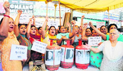 Activists of the BJP Mahila Morcha hold a demonstration against the UPA government in Amritsar on Friday. Photo: Vishal Kumar