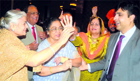 Dr Manuj Wadhwa (extreme right), director and head of orthopaedics, Fortis Hospital, Mohali, dances with arthritis patients during a function held at the JW Marriot Hotel in Chandigarh on Friday.