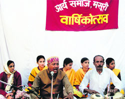 Bhajans being recited during the annual function of the Arya Samaj in Mussoorie on Friday. 