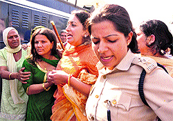 Smriti Irani, president of the BJP Mahila Morcha, courts arrest in protest against the unabated crime against women in Haryana near Rohtaks Canal Rest House on Friday