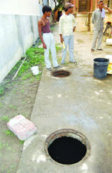 The gutter in which the child fell. 