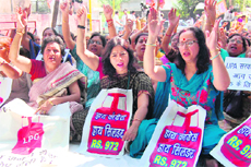 BJP Mahila Morcha stage a protest in Jammu on Friday.