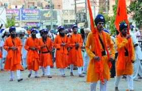Panj Piaras (the five beloved) lead a procession carried out to mark the birth anniversary of Guru Ram Das, the fourth Sikh guru, in Bathinda city on Saturday