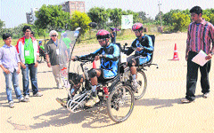 Participants drive their human-electric hybrid vehicle at the UIET, Panjab University, in Chandigarh on Saturday. 