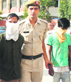 The accused in police custory at Sector 1, Panchkula. 
