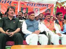Chief Minister Prem Kumar Dhumal at a workers meeting in Chamba on Saturday.