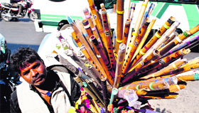 A vendor sells flutes in Srinagar. Photo: Yawar Kabli